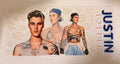 A custom acrylic standee featuring illustrated and photographed images of Justin Bieber, with 'JUSTIN BIEBER' printed vertically on the right side, set against a light background.